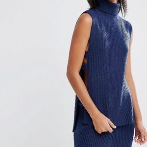Sleeveless turtle neck sweater